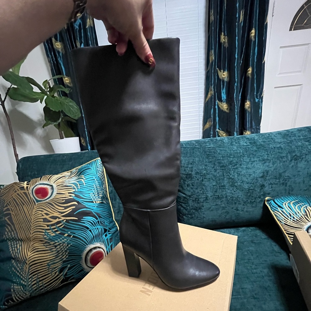 Black Steve Madden knee high boots